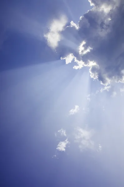 Nice sun beam shining through clouds sky — Stock Photo, Image