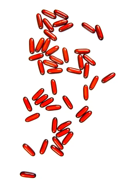 Słabnie błyszczące czerwone pigułki — Zdjęcie stockowe