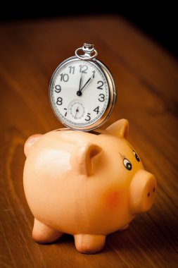 Cep saati üzerinde bir kumbara