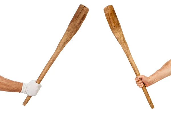 Two hands holding bats — Stock Photo, Image