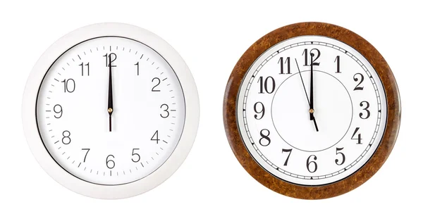 Two clock faces showing twelve o'clock — Stock Photo, Image