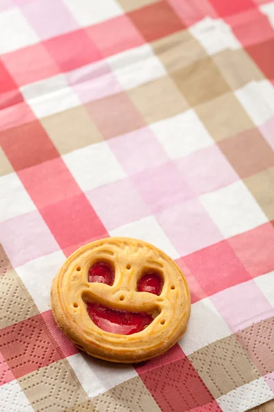 Cookie leende på en tabell — Stockfoto