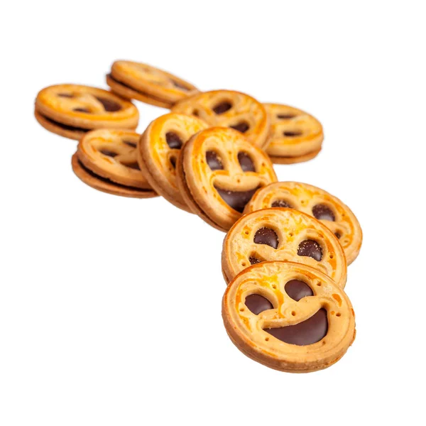 Hromadu kulaté sušenky s úsměvem izolované — Stock fotografie