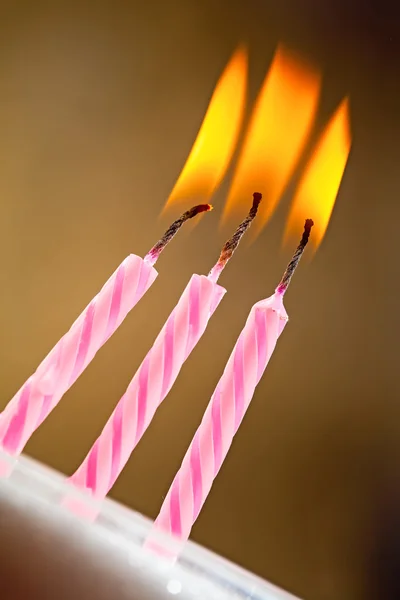 Tres velas de cumpleaños ardientes —  Fotos de Stock