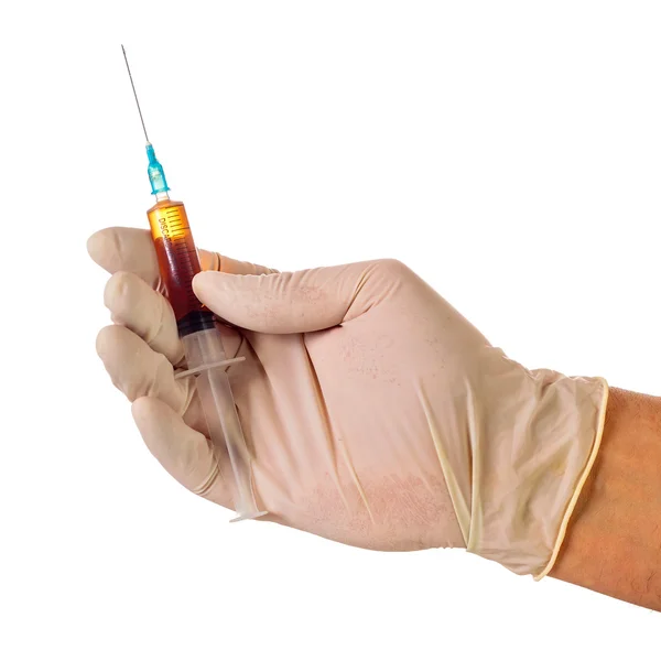 Hand holding medical syringe — Stock Photo, Image