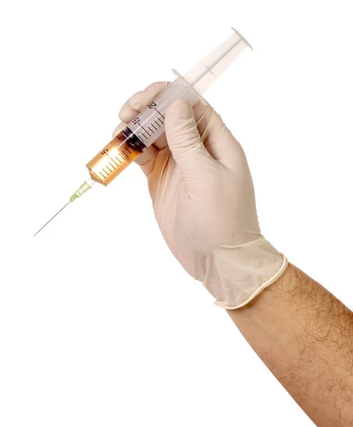 Hand holding medical needle — Stock Photo, Image