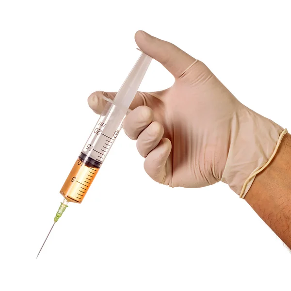 Hand holding medical needle — Stock Photo, Image