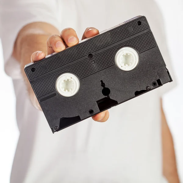 Cassette VHS sostener a mano — Foto de Stock