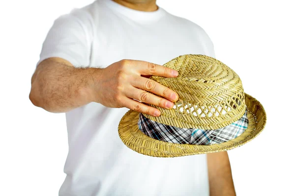 Straw hat hold by hand — Stock Photo, Image