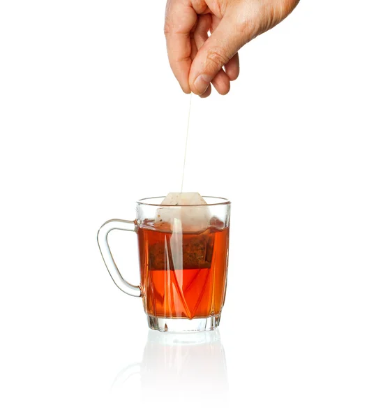 Transparent teacup with fresh tea — Stock Photo, Image