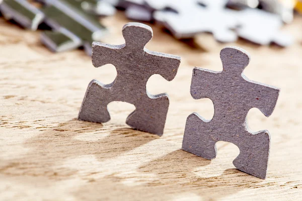 Two pieces of jigsaw puzzle — Stock Photo, Image