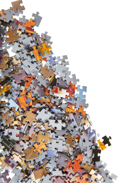 Pile of color jigsaw pieces — Stock Photo, Image