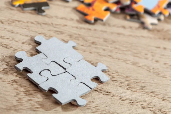 Close up of Connected Jigsaw Puzzle Pieces — стоковое фото