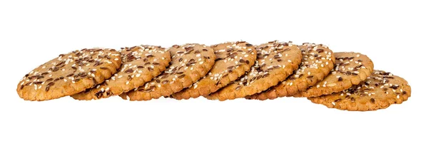 Pilha de biscoitos redondos com sementes de sésamo e linho — Fotografia de Stock