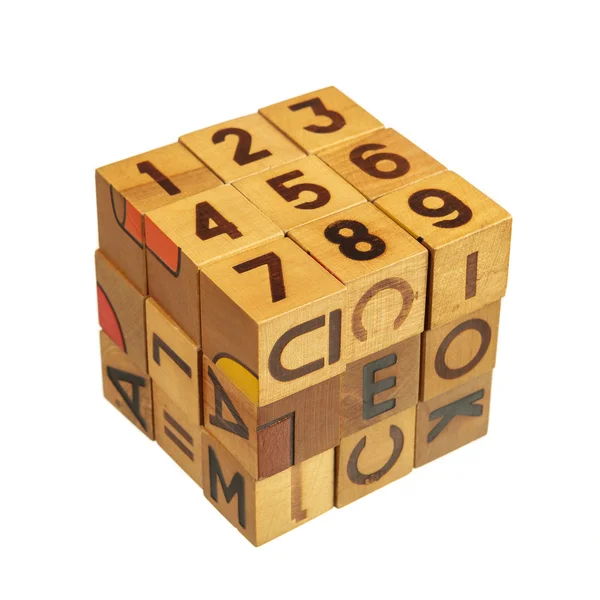 Cube made of wooden blocks with numbers and letters — Stock Photo, Image