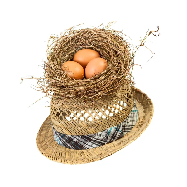 HAy cappello con uova di gallina — Foto Stock