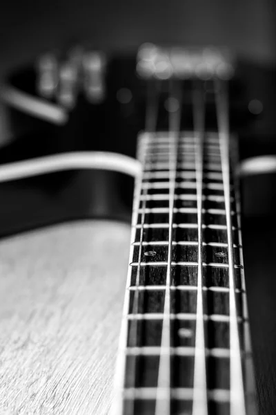 Body of a classic black bass guitar — Stock Photo, Image