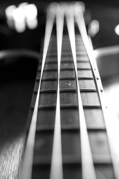 Body of a classic black bass guitar — Stock Photo, Image