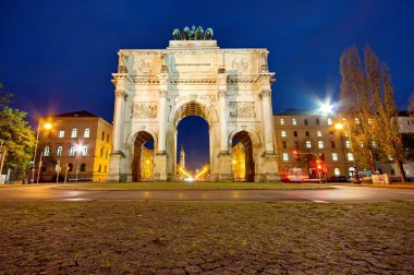 The Siegestor (Victory Gate) at night in Munich, Germany, Europe clipart
