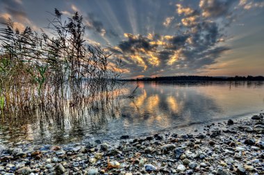 Sunset at lake Chiemsee in Germany clipart