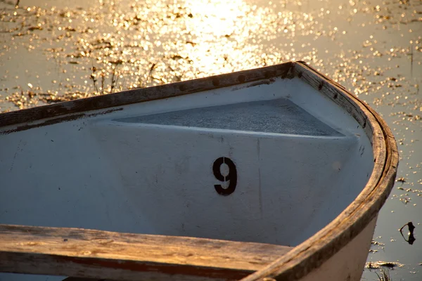 Boat number nine on a lake — Stock Photo, Image