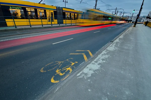 Moving yellow tram on the street — Stock Photo, Image