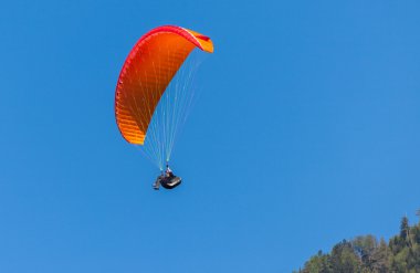 Paraglider with red glider clipart