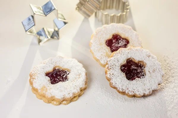 Christmas cookies and cookie cutters — Stock Photo, Image