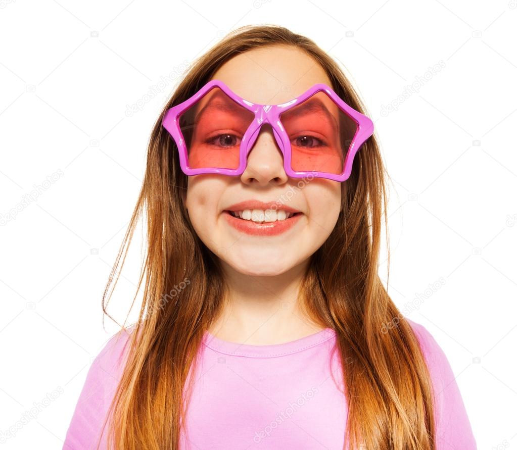 Happy face of girl in glasses with star frames
