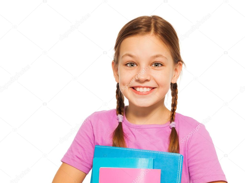 Happy positive pupil with books