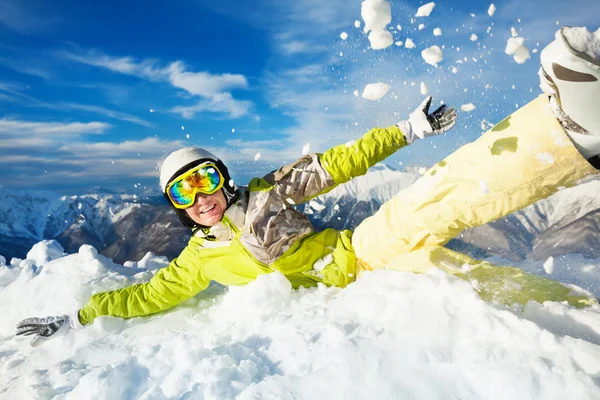 Happy skier woman jump in and throw snow — Stock Photo, Image