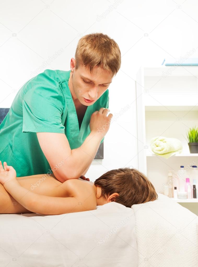 Boy medical massage — photo 1