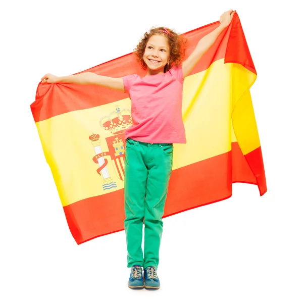 Menina de cabelos encaracolados segurando bandeira espanhola — Fotografia de Stock