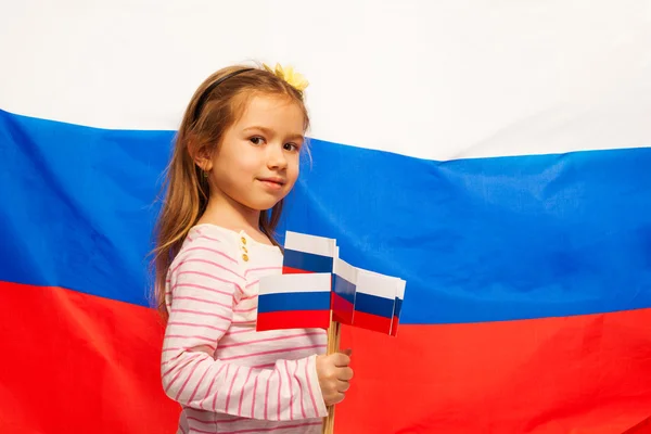 Little girl with symbol of her homeland — Stock Photo, Image