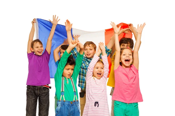 Niños sonriendo y ondeando la bandera francesa —  Fotos de Stock