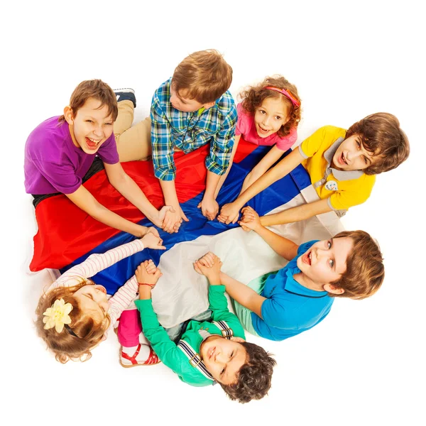 Kids sitting in  circle with flag of Russia — Stock Photo, Image