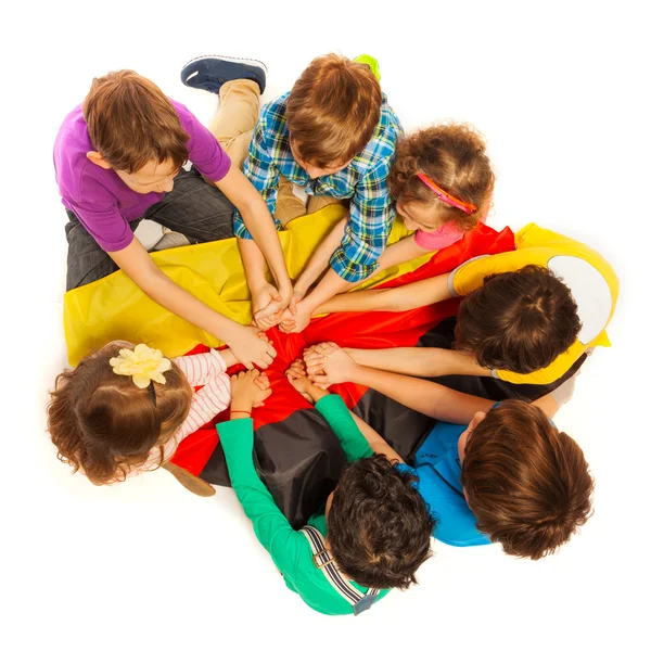 Kids holding their arms together — Stock Photo, Image