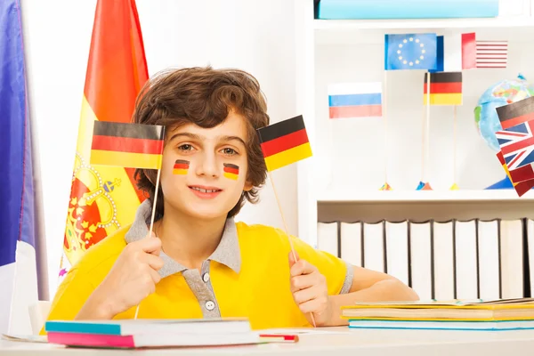 German schoolboy holding flags — Stock Photo, Image