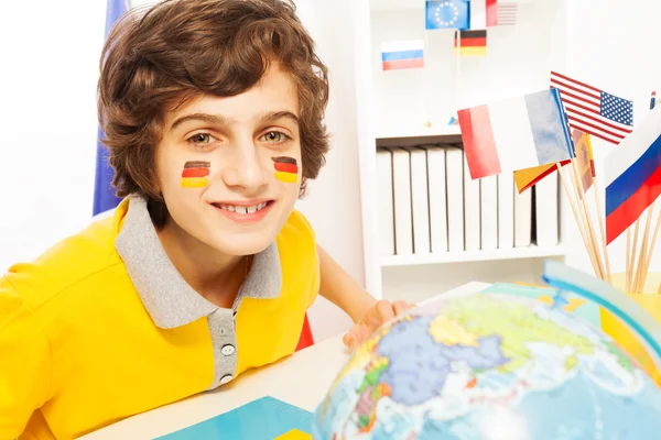 German schoolboy learning geography — Stock Photo, Image