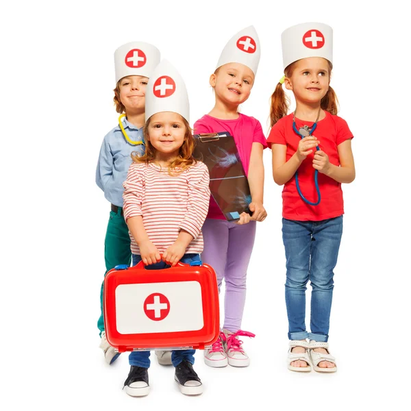 Little doctors giving an emergency aid — Stock Photo, Image