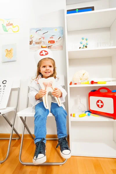 Funny girl dressed as a dentist — Stock Photo, Image