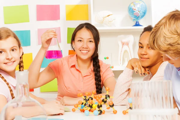 Asian teenage student in science class — Stock Photo, Image