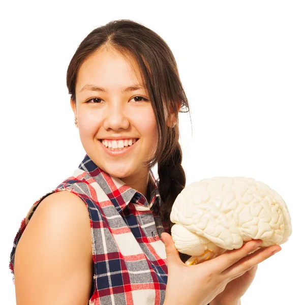 Stará dívka drží mozek modelu — Stock fotografie