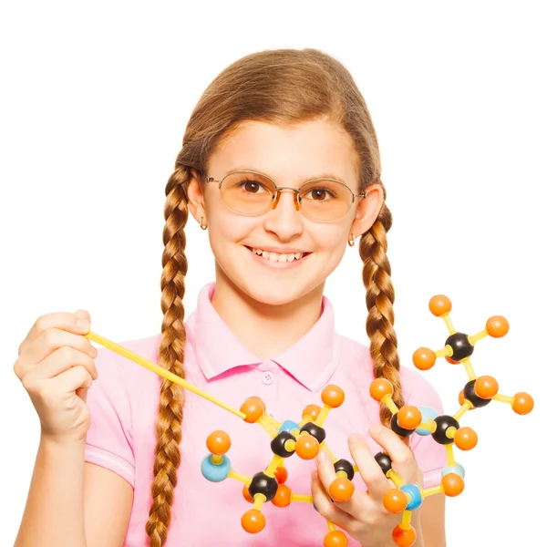 Девушка в очках и молекулярной модели — стоковое фото