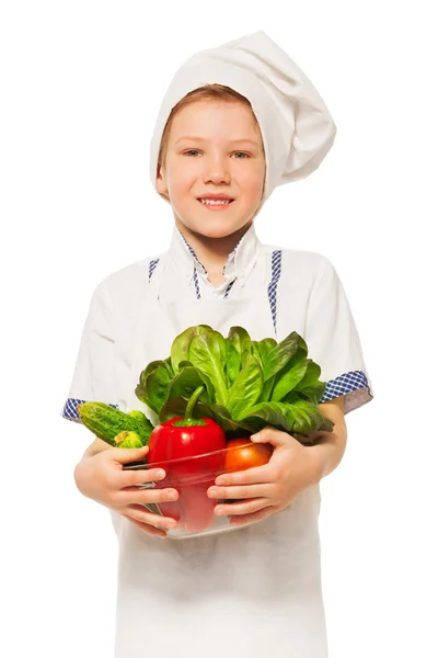 Молодая улыбающаяся кухарка — стоковое фото