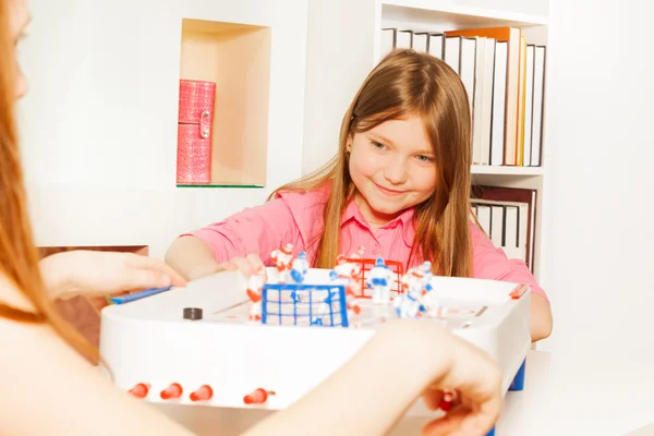 Irls happy playing table — стоковое фото