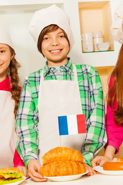 Smiling boy in apron — Stock Photo, Image