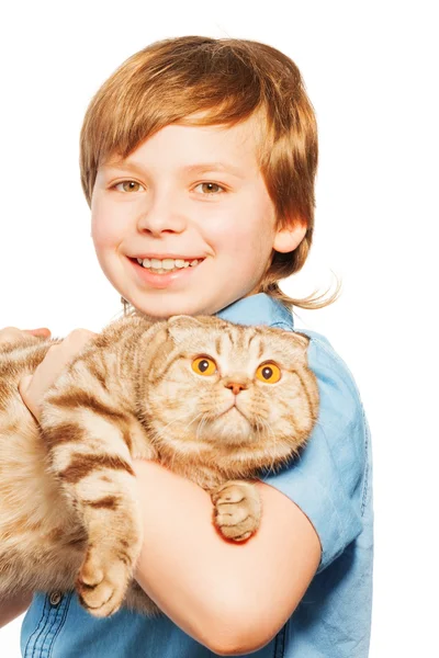 Smiling boy holding big cat — Stock Photo, Image