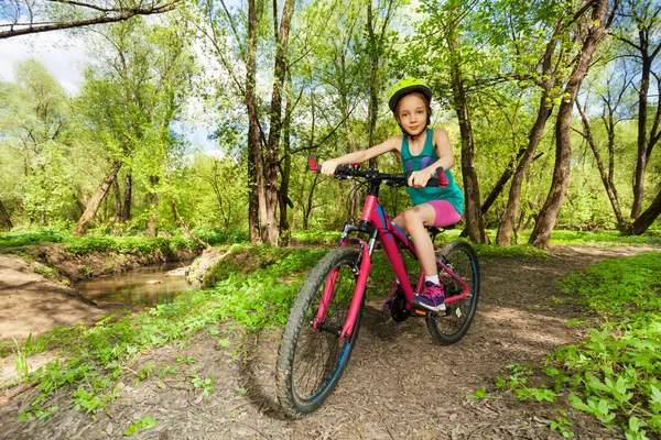 Young girl cycling mountain bike — Stock Photo, Image
