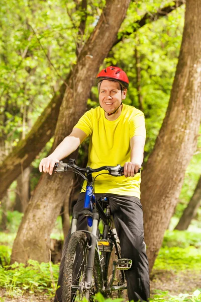 Portrait of active man riding  bike — Stock Photo, Image